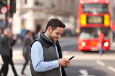 Male using mobile phone to access community. Promote quality of life through Neuro Rehabilitation.Rehabilitation. 