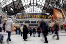 People at busy city train station. Increasing independence through Rehabilitation. 