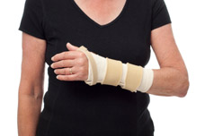 Female wearing wrist splint. Splinting Therapy to help with tissues and ligament problems.